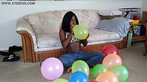 Watch ebony fetish babe inflate huge balloons french style!