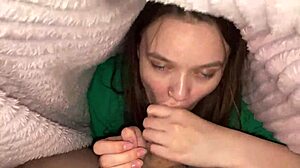 Stepdaughter Sneaks Under Blanket for Stepdad's Deep Blowjob