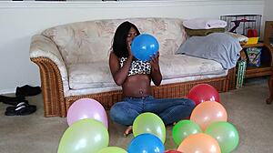 Watch ebony fetish babe inflate huge balloons french style!