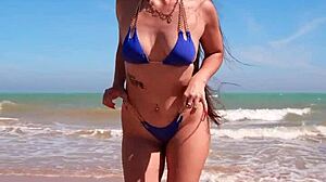 damn petite tanned neighbor flashes blue bikini pussy on crowded beach