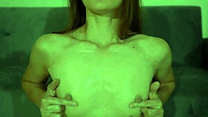 Skinny tattooed babe lotions nipples in teasing solo play