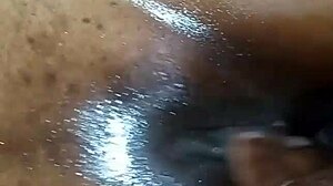 melina's oiled pussy bent over doggystyle filled with tall black cock cum orgasm tits shaking