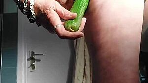 GRANNY OMA FUCKS WET CUNT WITH CUCUMBER!!