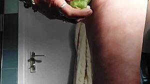 GRANNY OMA FUCKS WET CUNT WITH CUCUMBER!!
