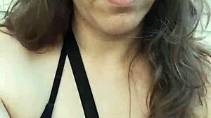 Kelly Kendricks Smokes Clothed with Deep Brunette Cleavage Outdoors