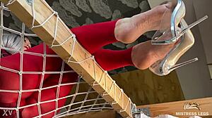 bare feet dangle see-through heels in closeup tease