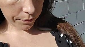 Kelly Kendricks Smokes Clothed with Deep Brunette Cleavage Outdoors