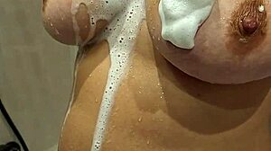 Young Milf Flaunts Massive Tits Up Close