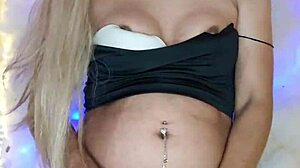 Dressed transsexual pulls cock in sexy crossdress tease