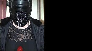 Masked Bisexual Crossdresser Gags On Homemade Dildo Toy