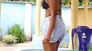 blonde cutie gets horny watching ebony stud's close-up piss stream