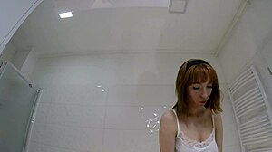 tall redhead coed flashes pussy ass no panties in bathroom