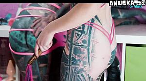 damn these shaved goth lesbians go wild with strapon anal whipping and squirting orgasms