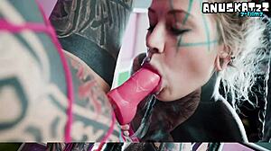 damn these shaved goth lesbians go wild with strapon anal whipping and squirting orgasms