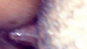 guy strokes her bent over wet pussy doggystyle