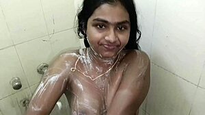 submissive slave masturbates in carrot during bathroom shower with master