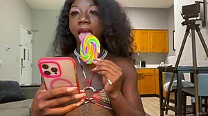 Lola Black Licks Lollipop Teasing Her Sexy Pierced Nipples