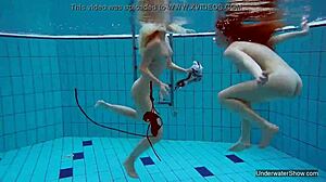 Two hot lesbians tease underwater pool secrets