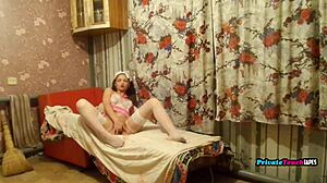 Pretty russian with long legs fingers her tight natural pussy