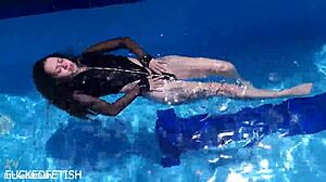 Latex Jessica Bunny Dives Underwater Sensually