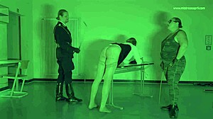 Dominatrix Mistress April Brutally Fucks Bound Prisoner with Strapon in Military Camp