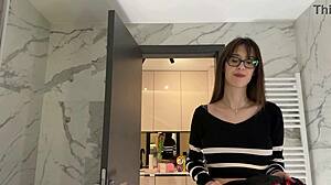 imagine tall brunette secretary in glasses lifting skirt in office bathroom
