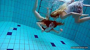 Two hot lesbians tease underwater pool secrets