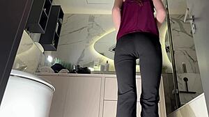 imagine tall brunette secretary in glasses lifting skirt in office bathroom