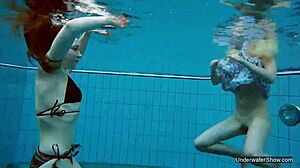 Two hot lesbians tease underwater pool secrets