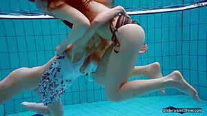 Two hot lesbians tease underwater pool secrets