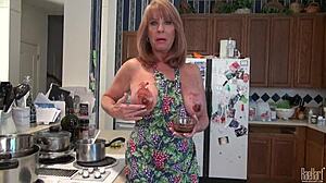 Mature housewife raehart pleasures kitchen duties with huge tits