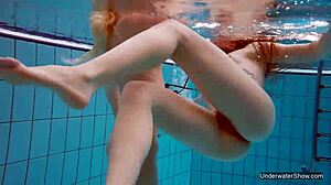 Two hot lesbians tease underwater pool secrets