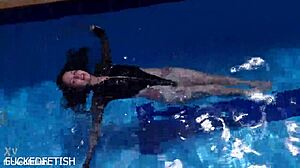 Latex Jessica Bunny Dives Underwater Sensually