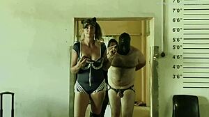 Dominatrix Mistress April Brutally Fucks Bound Prisoner with Strapon in Military Camp