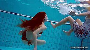 Two hot lesbians tease underwater pool secrets