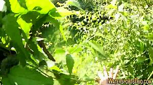 Golden shower lesbians toy each other outdoors in stockings