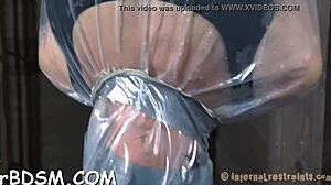 Punished playgirl in latex dress toys pussy in garage bdsm