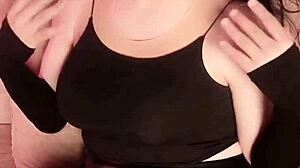 Goth shemale's vampirish white booty shakes in leather skirt