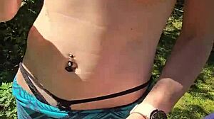 Wife sneaks quick handjob on walk flashing pierced nipples under skirt