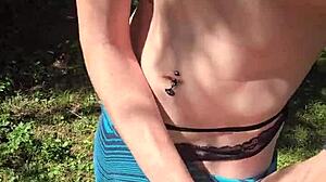 Wife sneaks quick handjob on walk flashing pierced nipples under skirt