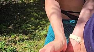 Wife sneaks quick handjob on walk flashing pierced nipples under skirt