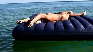 Isn't this tattooed blonde bitch's big boobs stunning on nude beach?