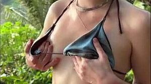 horny bikini teen oils tits sucks cock on public beach