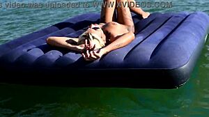 Isn't this tattooed blonde bitch's big boobs stunning on nude beach?