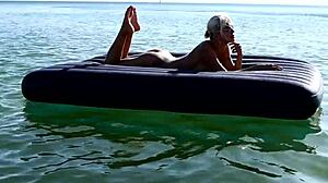 Isn't this tattooed blonde bitch's big boobs stunning on nude beach?