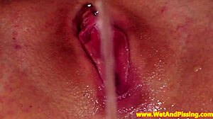i'm spexing out pissing hard while gaping toying my pierced shaved pussy close-up