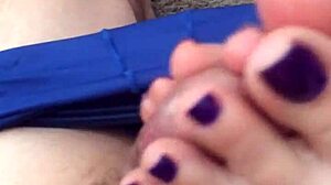 her purple toes wrap around for teasing footjob