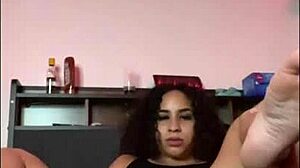 horny latina shakes ass with dildo on bed