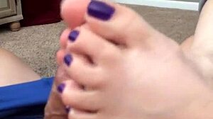 her purple toes wrap around for teasing footjob