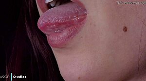 Karly takes huge facial after cute femdom sucking and domination kiss in HD!